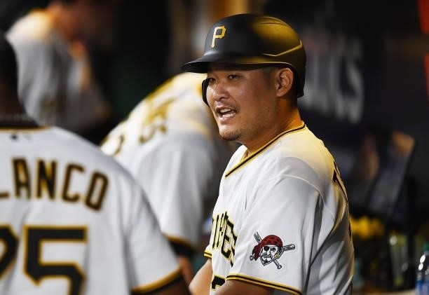 Yoshi Tsutsugo of the Pittsburgh Pirates celebrates with teammates after hitting a solo home run during the seventh inning against the Arizona...
