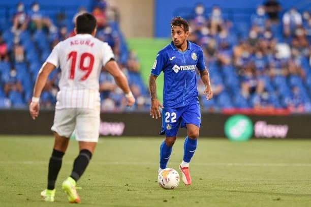Damian Suarez and Marcos Acuna during La Liga match between Getafe CF and Sevilla FC at Coliseum Alfonso Perez on August 23, 2021 in Getafe, Spain.