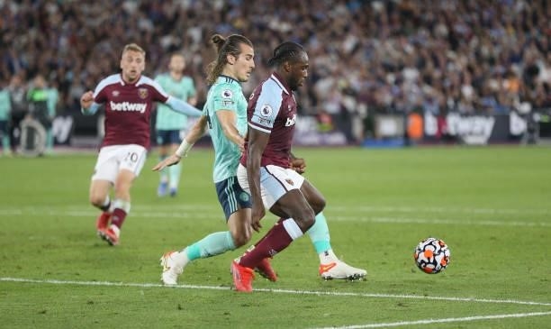 West Ham United's Michail Antonio and Leicester City's Caglar Soyuncu during the Premier League match between West Ham United and Leicester City at...