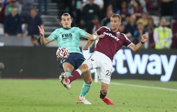 West Ham United's Tomas Soucek and Leicester City's Caglar Soyuncu during the Premier League match between West Ham United and Leicester City at The...