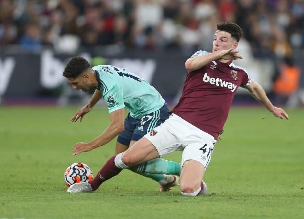 West Ham United's Declan Rice challenges Leicester City's Ayoze Perez during the Premier League match between West Ham United and Leicester City at...