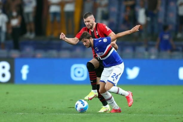Bartosz Bereszynski of UC Sampdoria and Ante Rebic of AC Milan battle for the ball during the Serie A match between UC Sampdoria and AC Milan at...