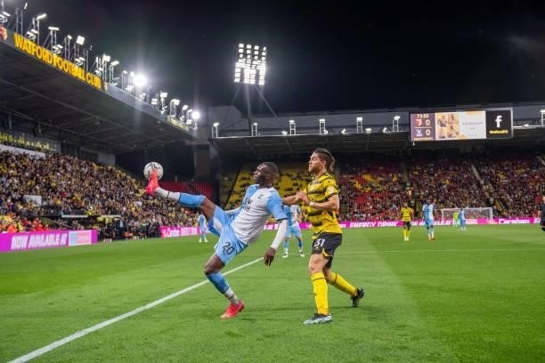 Christian Benteke of Crystal Palace and Francisco Sierralta of Watford in action during the Carabao Cup Second Round match between Watford and...