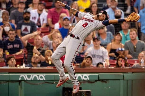 Luis Arraez of the Minnesota Twins catches a fly ball during the first inning of a game against the Boston Red Sox on August 24, 2021 at Fenway Park...