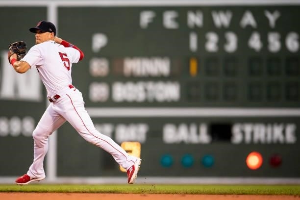 Enrique Hernandez of the Boston Red Sox throws during the first inning of a game against the Minnesota Twins on August 24, 2021 at Fenway Park in...