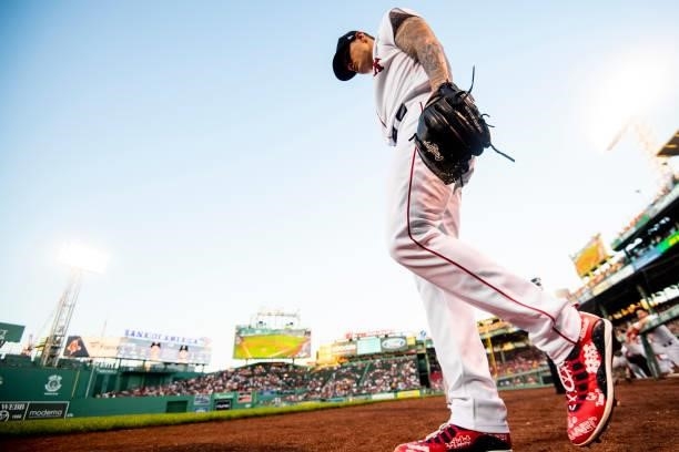 Tanner Houck of the Boston Red Sox walks onto the field before a game against the Minnesota Twins on August 24, 2021 at Fenway Park in Boston,...