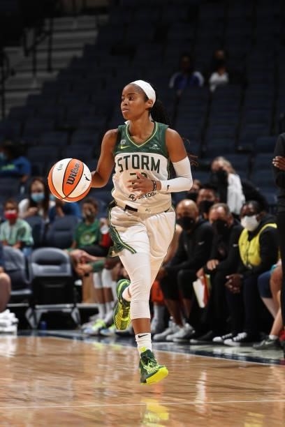 Jordin Canada of the Seattle Storm dribbles the ball during the game against the Minnesota Lynx on August 24, 2021 at Target Center in Minneapolis,...