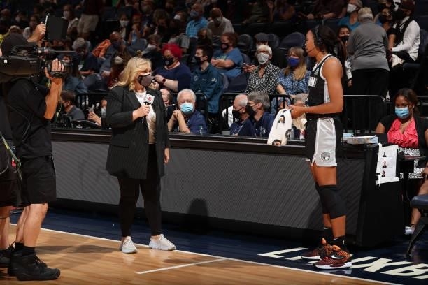 Reporter, Holly Rowe interviews Napheesa Collier of the Minnesota Lynx during the game against the Seattle Storm on August 24, 2021 at Target Center...
