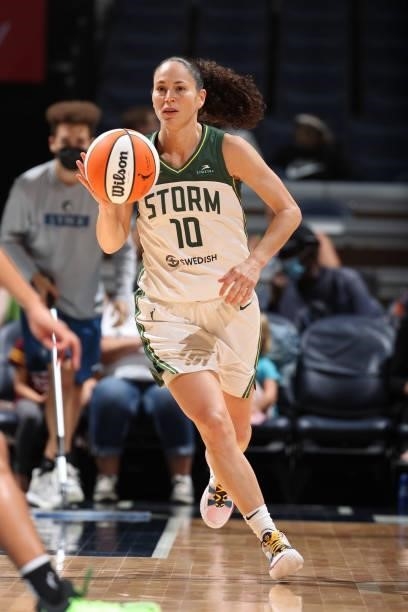 Sue Bird of the Seattle Storm dribbles the ball during the game against the Minnesota Lynx on August 24, 2021 at Target Center in Minneapolis,...