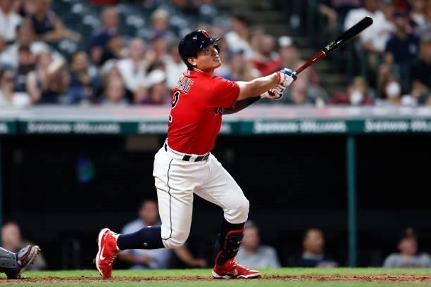 Yu Chang of the Cleveland Indians hits a solo home run off Taylor Hearn of the Texas Rangers during the fifth inning at Progressive Field on August...