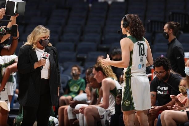 Reporter, Holly Rowe talks to Sue Bird of the Seattle Storm during the game against the Minnesota Lynx on August 24, 2021 at Target Center in...