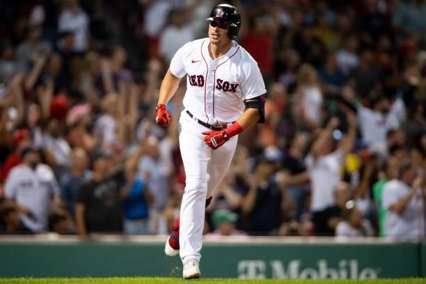 Hunter Renfroe of the Boston Red Sox reacts after hitting a two-run home run during the fifth inning of a game against the Minnesota Twins on August...