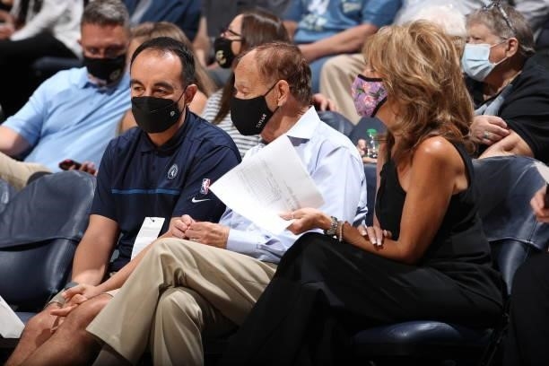 Minnesota Lynx owner, Glen Taylor and Wife, Becky Mulvihill talk to President of Basketball Operations Gersson Rosas during the game between the...