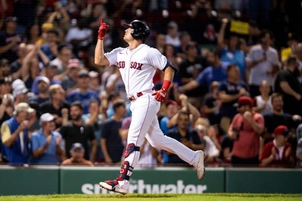 Hunter Renfroe of the Boston Red Sox reacts after hitting a three-run home run during the fourth inning of a game against the Minnesota Twins on...