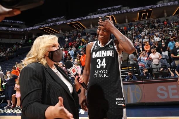 Reporter, Holly Rowe interviews Sylvia Fowles of the Minnesota Lynx after becoming the WNBA's 12th All-Time Scorer on August 24, 2021 at Target...