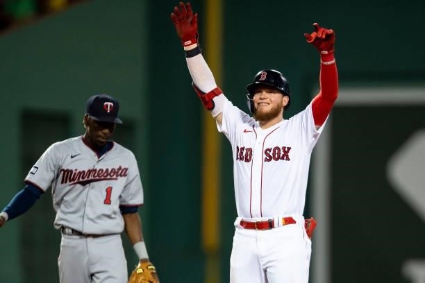 Alex Verdugo of the Boston Red Sox reacts after hitting a double during the fifth inning of a game against the Minnesota Twins on August 24, 2021 at...