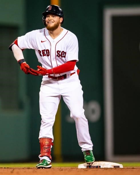 Alex Verdugo of the Boston Red Sox reacts after hitting a double during the fourth inning of a game against the Minnesota Twins on August 24, 2021 at...