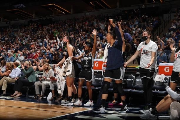 Aerial Powers and Crystal Dangerfield celebrate during the game against the Seattle Storm on August 24, 2021 at Target Center in Minneapolis,...