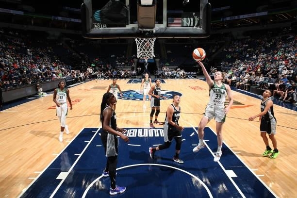 Katie Lou Samuelson of the Seattle Storm drives to the basket during the game against the Minnesota Lynx on August 24, 2021 at Target Center in...