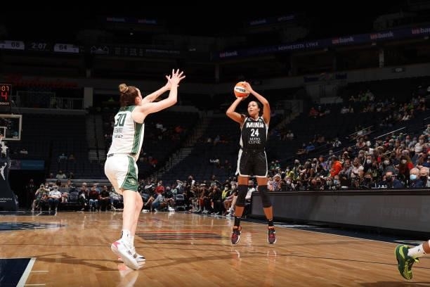 Napheesa Collier of the Minnesota Lynx shoots a three point basket during the game against the Seattle Storm on August 24, 2021 at Target Center in...