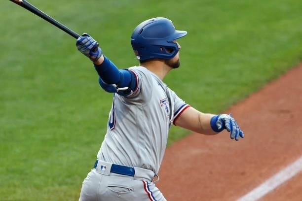 Nathaniel Lowe of the Texas Rangers hits a three-run home run off of Eli Morgan of the Cleveland Indians in the first inning at Progressive Field on...