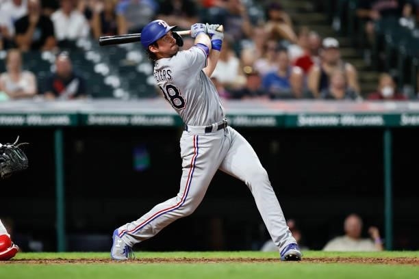 Peters of the Texas Rangers hits a three-run home run off of Bryan Shaw of the Cleveland Indians in the ninth inning at Progressive Field on August...
