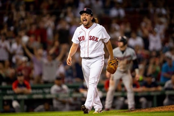 Hirokazu Sawamura of the Boston Red Sox reacts during the seventh inning of a game against the Minnesota Twins on August 24, 2021 at Fenway Park in...