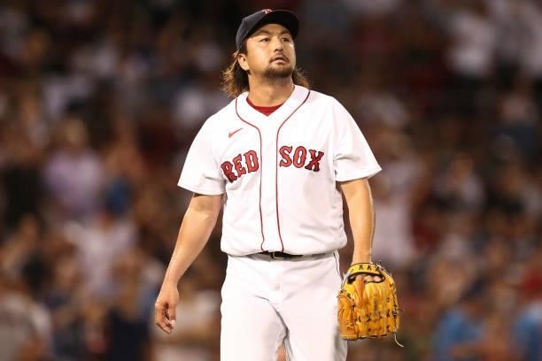 Hirokazu Sawamura of the Boston Red Sox looks on in the seventh inning of a game against the Minnesota Twins at Fenway Park on August 24, 2021 in...