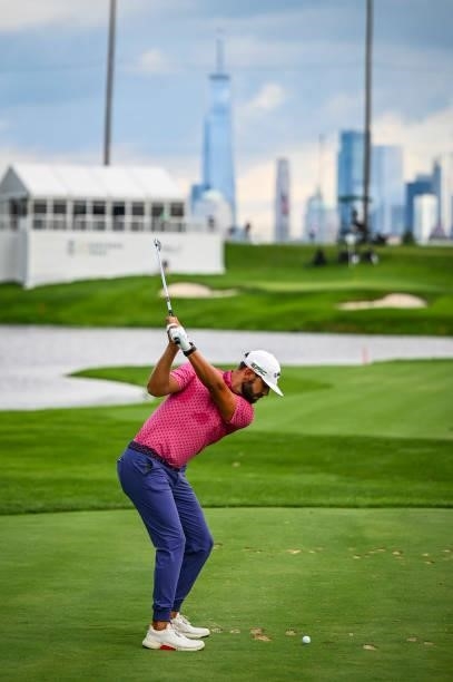 Erik van Rooyen of South Africa at the top of his swing as he plays his shot on the fourth hole towards the New York City skyline during the final...
