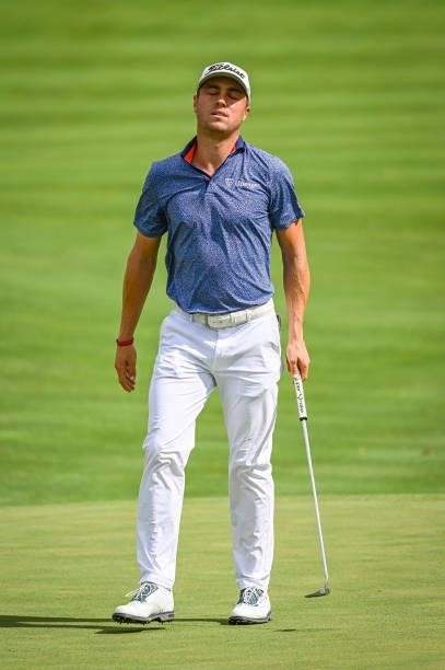 Justin Thomas reacts to his putt on the seventh hole green during the final round of THE NORTHERN TRUST, the first event of the FedExCup Playoffs, at...