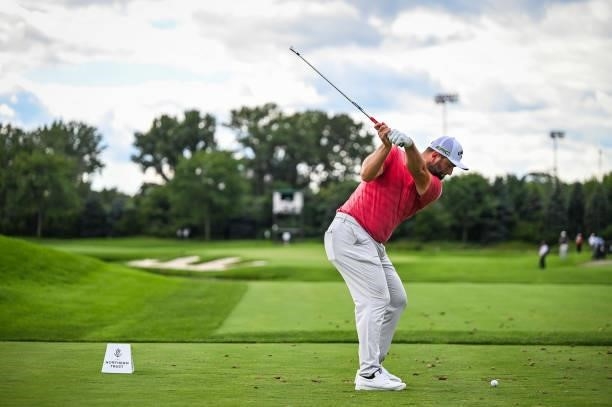 Jon Rahm of Spain at the top of his swing as he plays his shot from the 11th hole tee during the final round of THE NORTHERN TRUST, the first event...