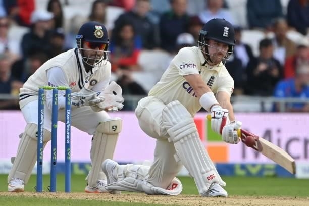 England's Rory Burns plays a shot on the first day of the third cricket Test match between England and India at Headingley cricket ground in Leeds,...