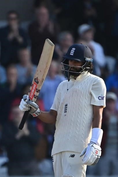 England's Haseeb Hameed celebrates his half-century on the first day of the third cricket Test match between England and India at Headingley cricket...