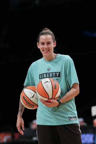 Assistant Coach, Jacki Gemelos of the New York Liberty smiles before the game against the Phoenix Mercury on August 25, 2021 at Barclays Center in...