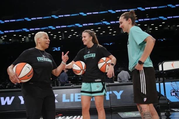 Assistant Coaches, Shelley Patterson and Jacki Gemelos talk with Sabrina Ionescu of the New York Liberty before the game against the Phoenix Mercury...