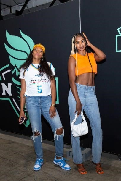 Betnijah Laney and DiDi Richards of the New York Liberty pose for a photo as they arrive to the game against the Phoenix Mercury on August 25, 2021...