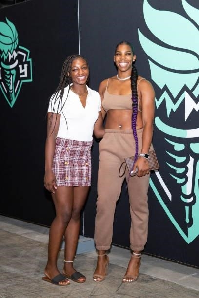 Michaela Onyenwere and Reshanda Gray of the New York Liberty pose for a photo as they arrive to the game against the Phoenix Mercury on August 25,...