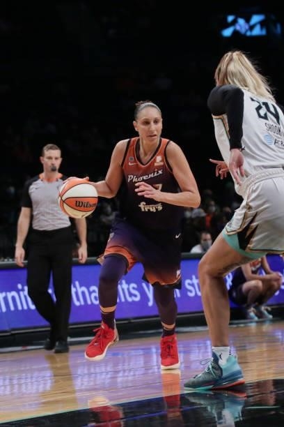 Diana Taurasi of the Phoenix Mercury drives to the basket against the New York Liberty on August 25, 2021 at Barclays Center in Brooklyn, New York....