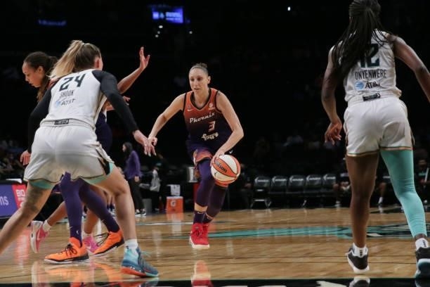 Diana Taurasi of the Phoenix Mercury handles the ball against the New York Liberty on August 25, 2021 at Barclays Center in Brooklyn, New York. NOTE...