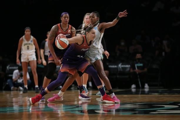 Diana Taurasi of the Phoenix Mercury handles the ball against the New York Liberty on August 25, 2021 at Barclays Center in Brooklyn, New York. NOTE...