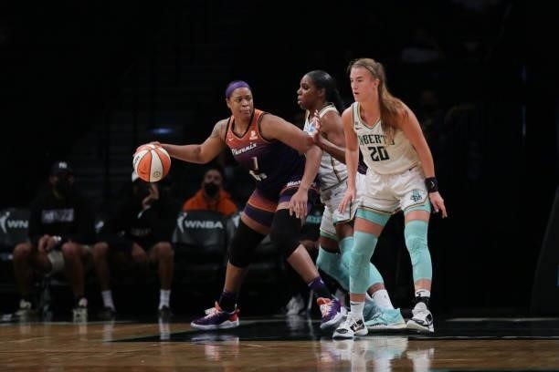Kia Vaughn of the Phoenix Mercury handles the ball against the New York Liberty on August 25, 2021 at Barclays Center in Brooklyn, New York. NOTE TO...