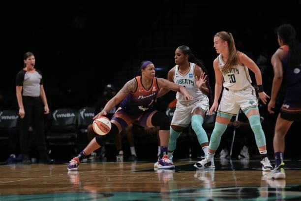 Kia Vaughn of the Phoenix Mercury handles the ball against the New York Liberty on August 25, 2021 at Barclays Center in Brooklyn, New York. NOTE TO...
