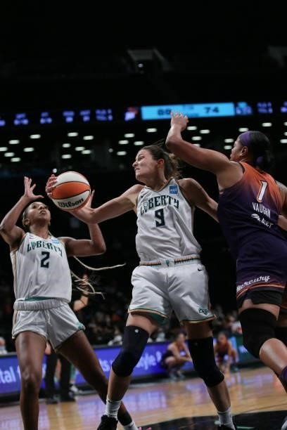 Rebecca Allen of the New York Liberty grabs the ball against the Phoenix Mercury on August 25, 2021 at Barclays Center in Brooklyn, New York. NOTE TO...