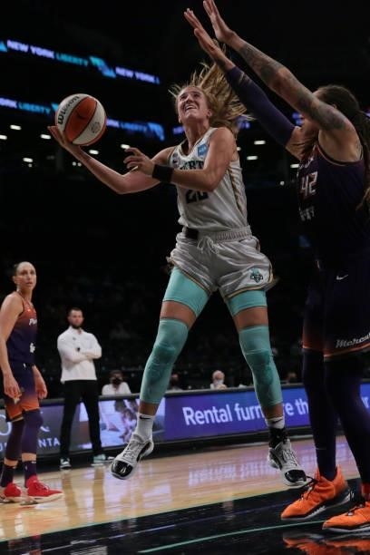 Sabrina Ionescu of the New York Liberty shoots the ball against the Phoenix Mercury on August 25, 2021 at Barclays Center in Brooklyn, New York. NOTE...
