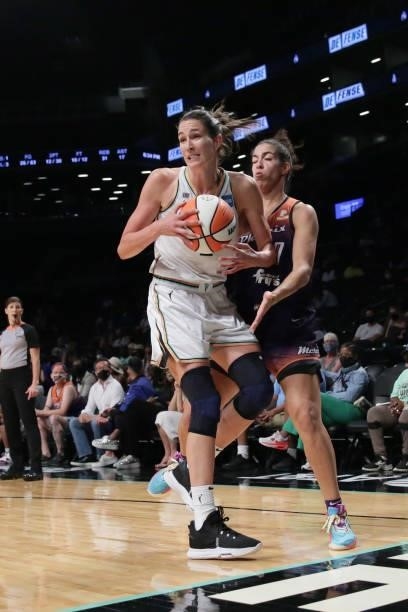Rebecca Allen of the New York Liberty handles the ball against the Phoenix Mercury on August 25, 2021 at Barclays Center in Brooklyn, New York. NOTE...