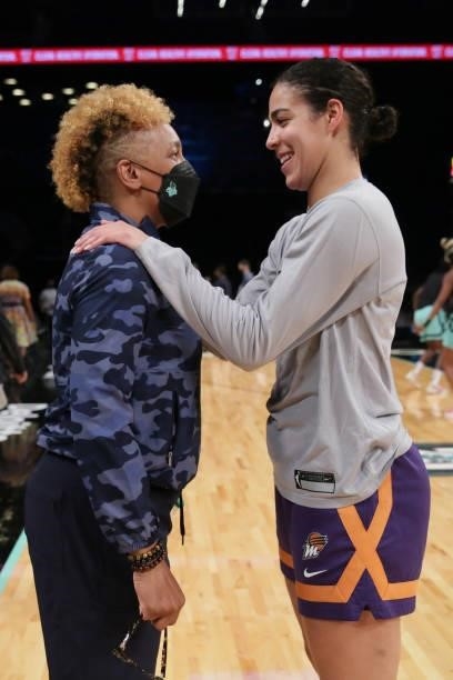 Kia Nurse of the Phoenix Mercury talks with NBA legend, Teresa Weatherspoon before the game against the New York Liberty on August 25, 2021 at...