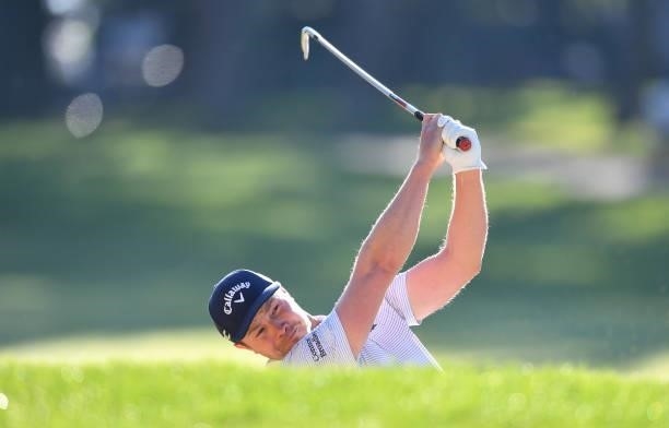 Oliver Fisher of England plays his second shot to the 1st hole during Day One of The Omega European Masters at Crans-sur-Sierre Golf Club on August...