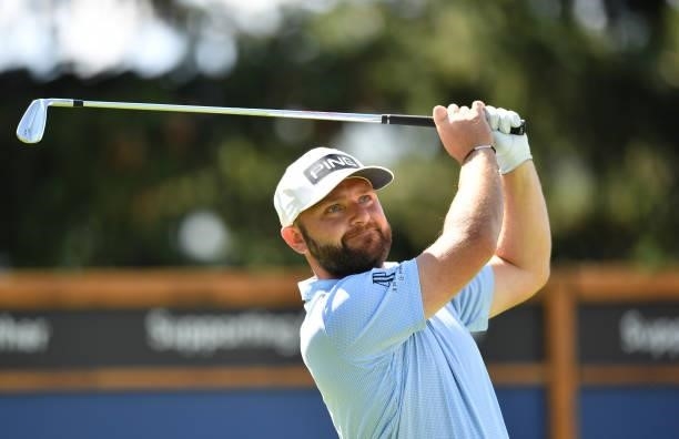 Andy Sullivan of England plays his tee shot to the 8th hole during Day One of The Omega European Masters at Crans-sur-Sierre Golf Club on August 26,...