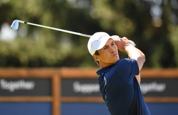 Thorbjorn Olesen of Denmark plays his tee shot to the 8th hole during Day One of The Omega European Masters at Crans-sur-Sierre Golf Club on August...