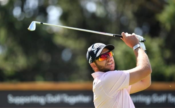 Dean Burmester of Republic of South Africa plays his tee shot to the 8th hole during Day One of The Omega European Masters at Crans-sur-Sierre Golf...